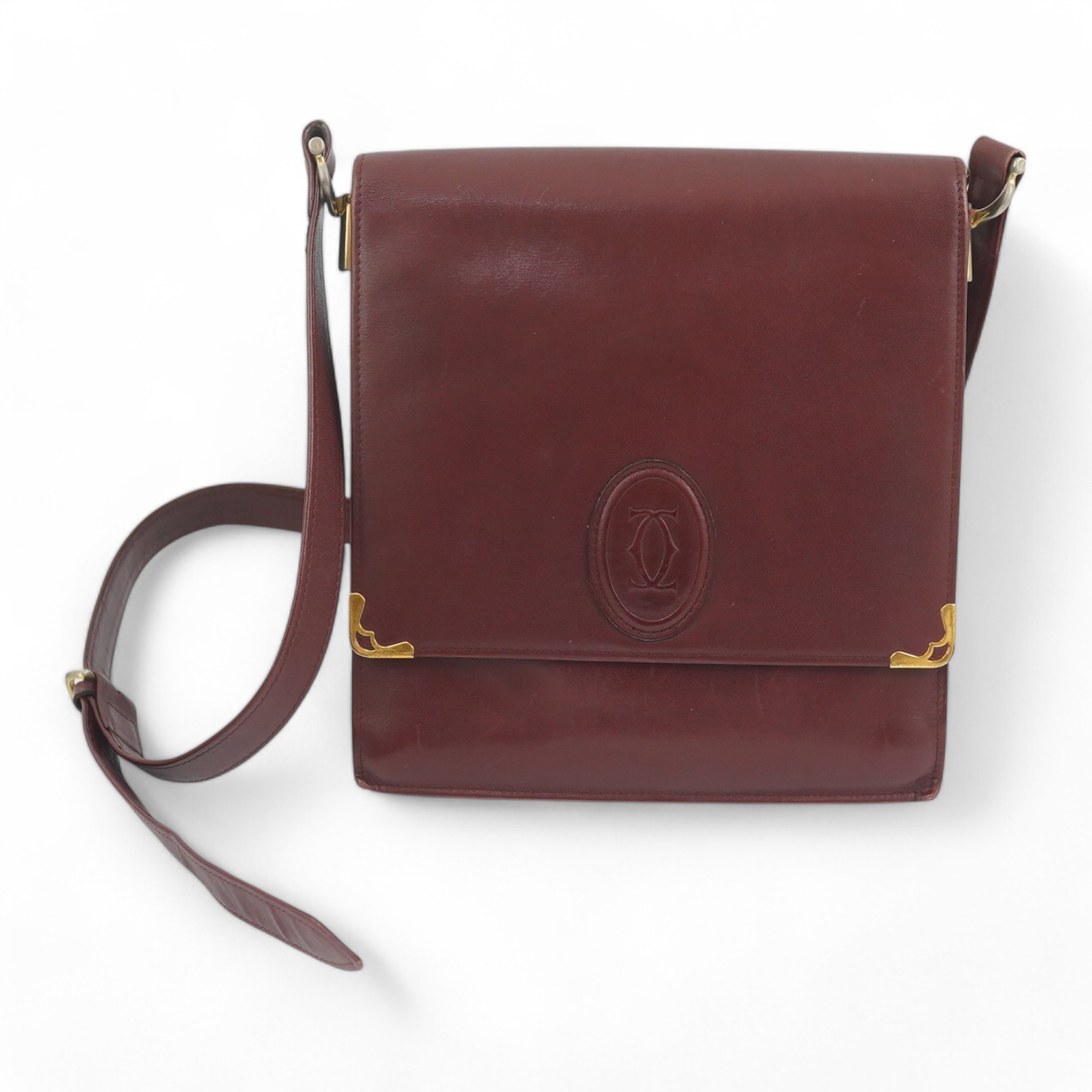 A Must de Cartier lady's leather shoulder bag in bordeaux